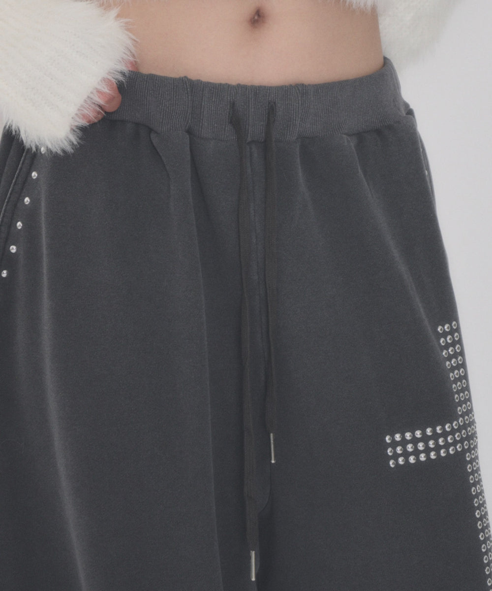 クロススタッズスウェットパンツ