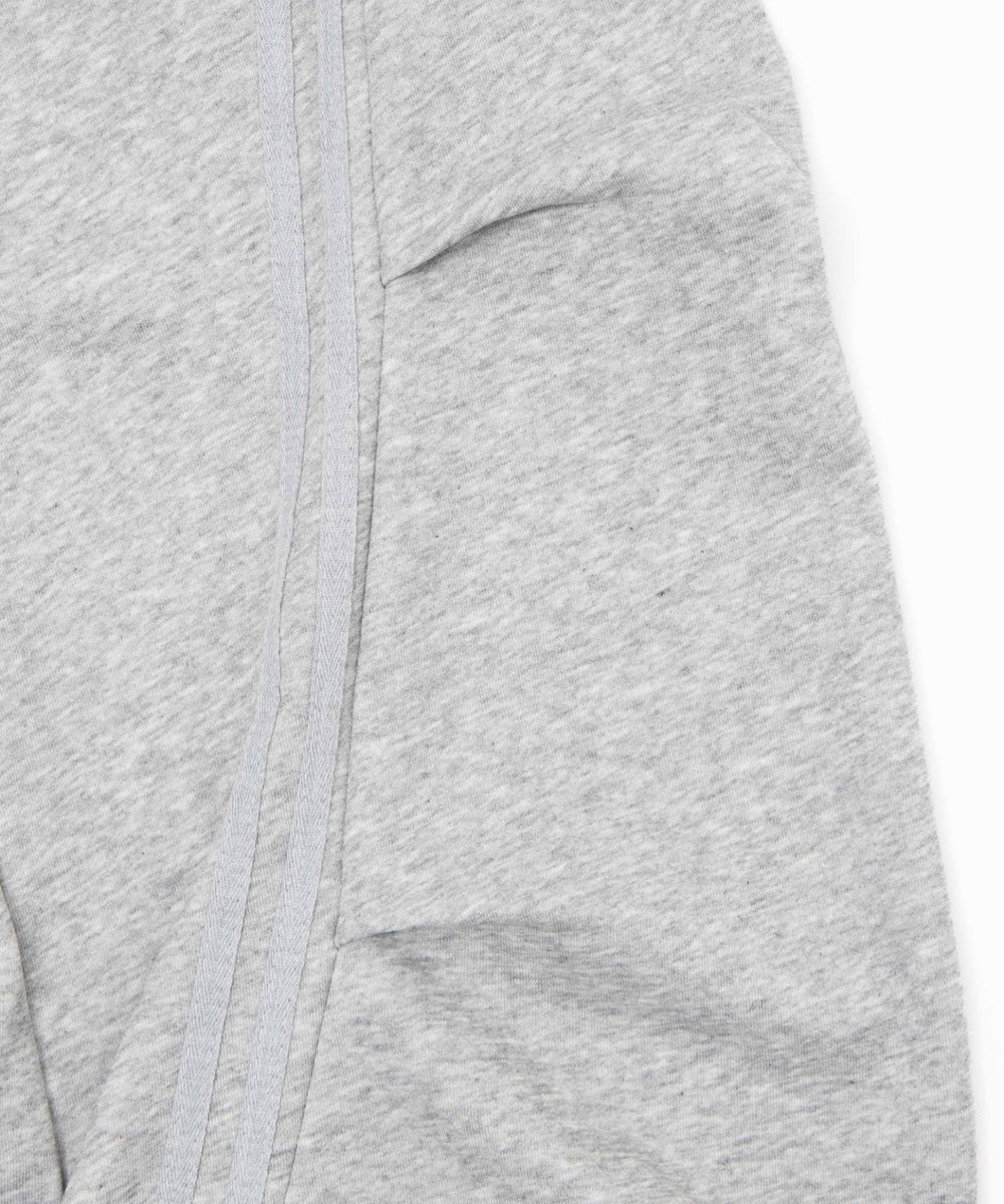 スタッズスウェットカーブパンツ