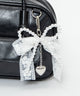 レイヤーリボンチャーム付きボストンバッグ